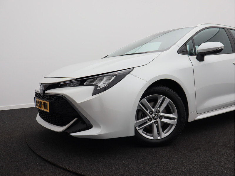 Toyota Corolla Touring Sports 1.8 Hybrid Active/ lage km/ wit metallic! zeer mooi!